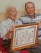昨年、110歳で日本最高齢の男性になり、磐田市長から祝状を受け取った清隆さん(左)と息子の重宏さん(右)　(写真／ご家族提供)