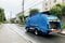 住宅街を走るゴミ収集車
