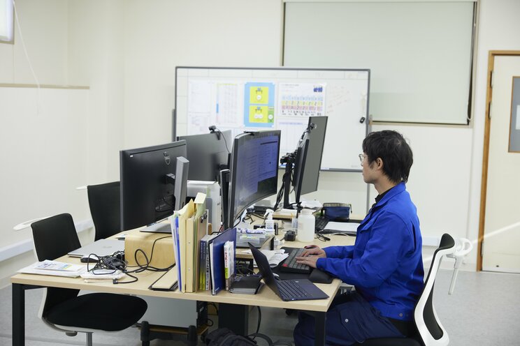 ものづくり戦略室で働く広報の田中さん。コミケで注目を集めた「消臭ゲート」でも活躍した。