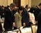 2月18日、兵庫県議会本会議の冒頭、故竹内英明元県議に黙祷する同僚県議ら 撮影/集英社オンライン