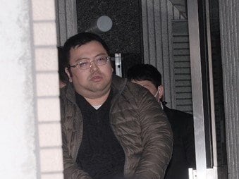 逮捕された際の細谷健一容疑者（撮影/集英社オンライン)