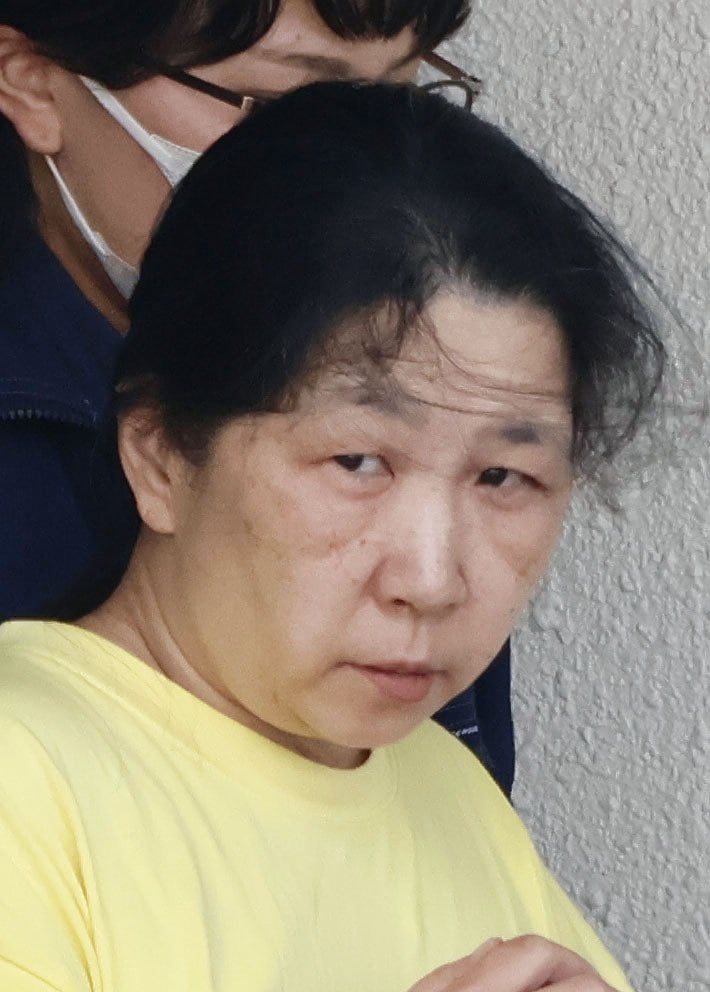 逮捕された、娘の秀子容疑者（写真／共同通信社）