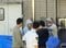福生警察署に移送される高林容疑者（撮影／集英社オンライン）